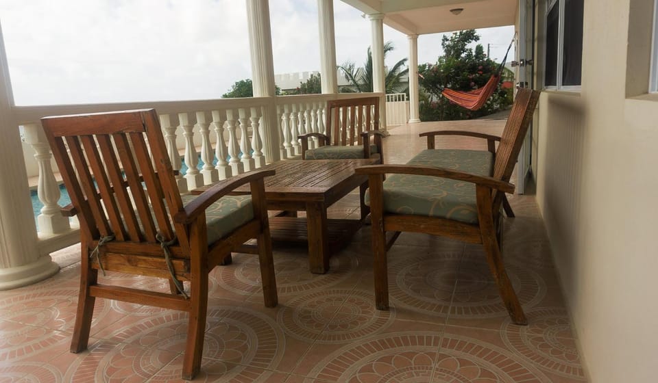 Balcony/Terrace, Seating area, Sea view, Swimming pool