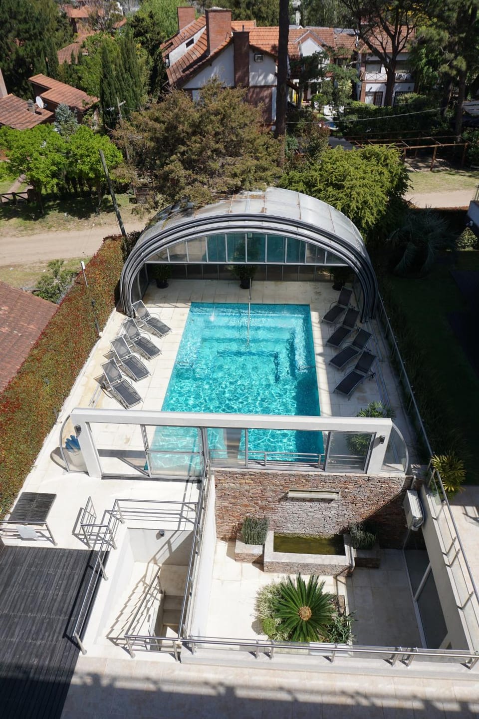Property building, Patio, Day, Pool view, Swimming pool