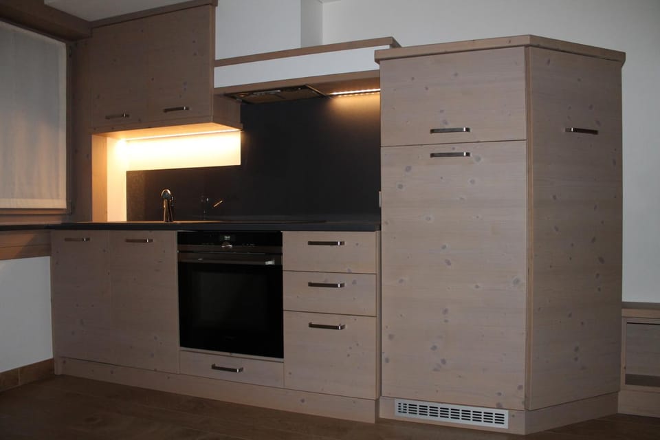 Kitchen or kitchenette, stove, wardrobe