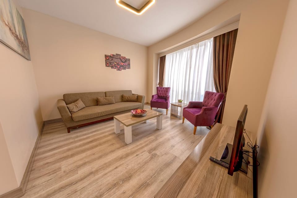 TV and multimedia, Living room, Seating area, Pool view, Sea view, Quiet street view