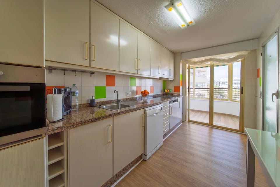 Kitchen or kitchenette, dishwasher, microwave, oven, washing machine