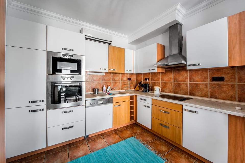 Kitchen or kitchenette, oven, stove