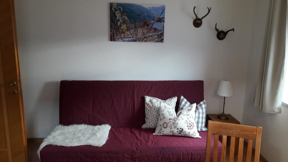 Bed, Living room, Seating area