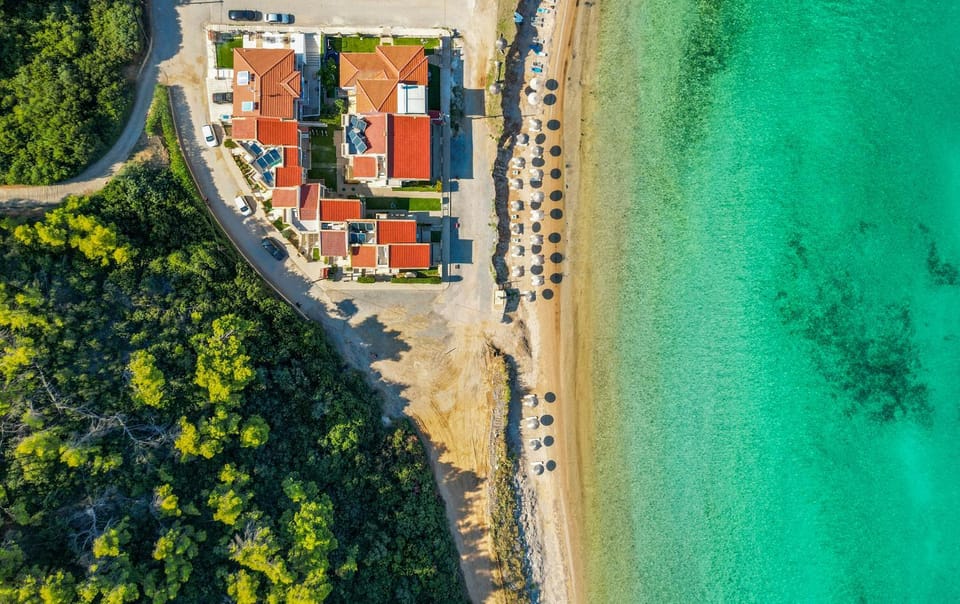 Property building, Day, Natural landscape, Bird's eye view, Beach