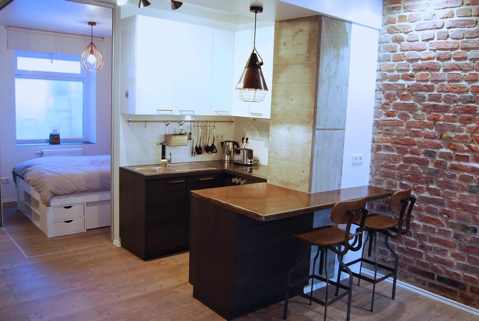 Coffee/tea facilities, Kitchen or kitchenette, Seating area, Dining area, Bedroom