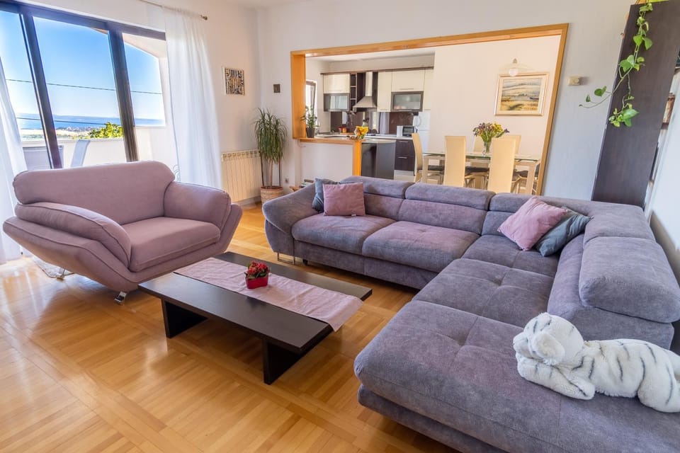 Living room, Seating area, City view, Sea view