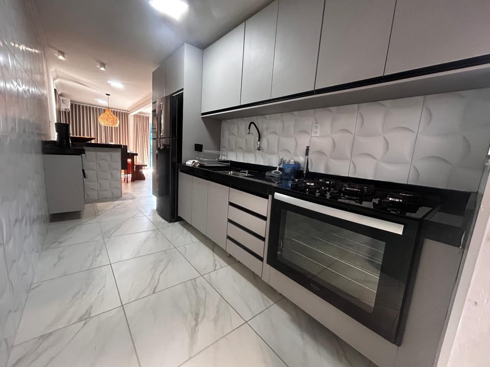Kitchen or kitchenette, stove, kitchen