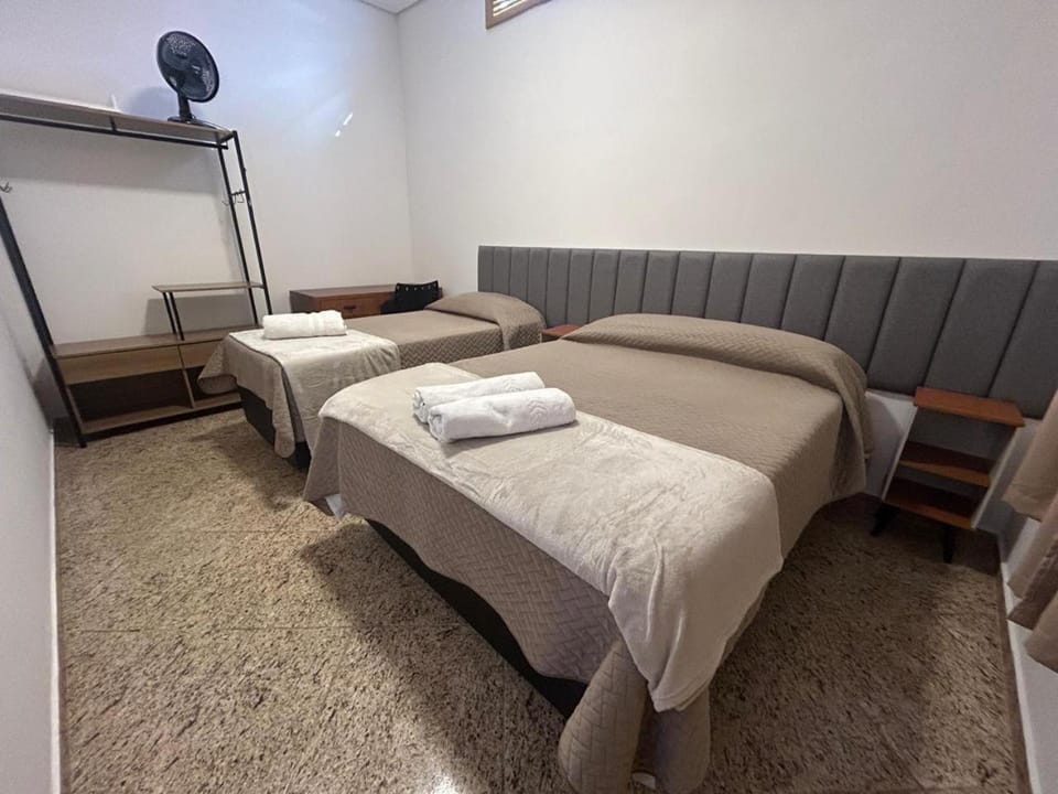 Bed, Bedroom, flat iron, towels, wardrobe, air conditioner
