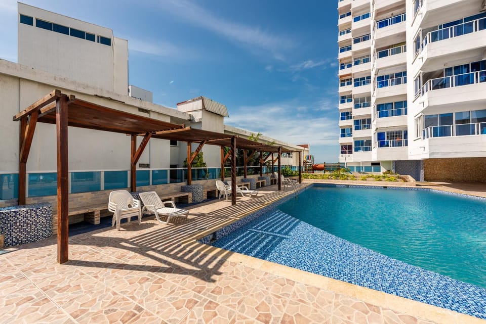 Property building, Day, Pool view, Swimming pool, sunbed