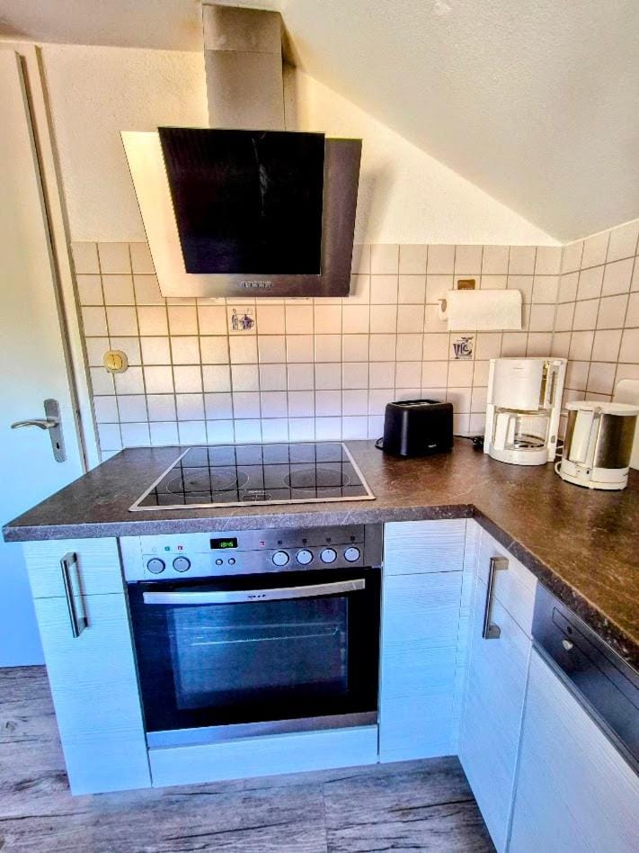 Kitchen or kitchenette, stove