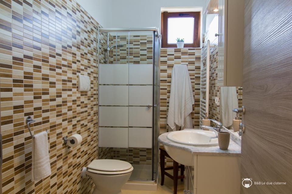 Shower, Toilet, Bathroom, bidet, hair dryier, towels