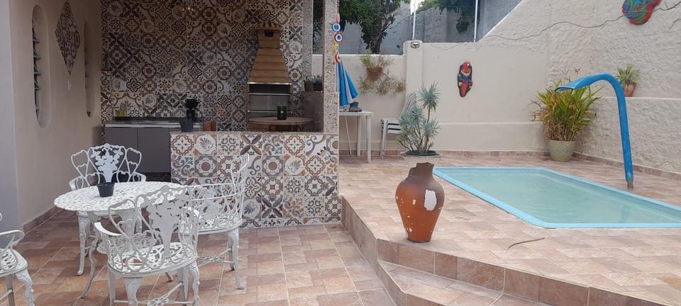 Patio, BBQ facilities, Pool view, Swimming pool