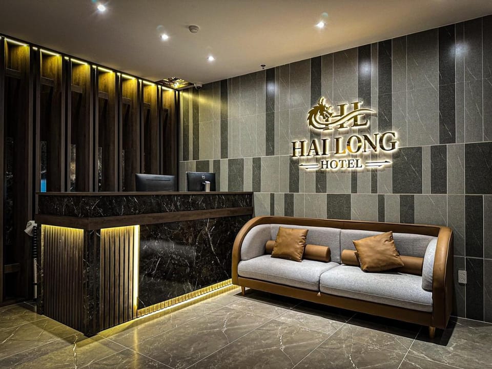 Bed, Property logo or sign, TV and multimedia, Living room, Photo of the whole room, Seating area, Logo/Certificate/Sign, Bedroom, Text overlay, Certificate/Award