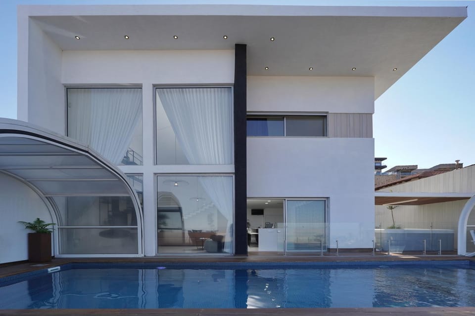 Property building, Patio, Day, Pool view, Swimming pool