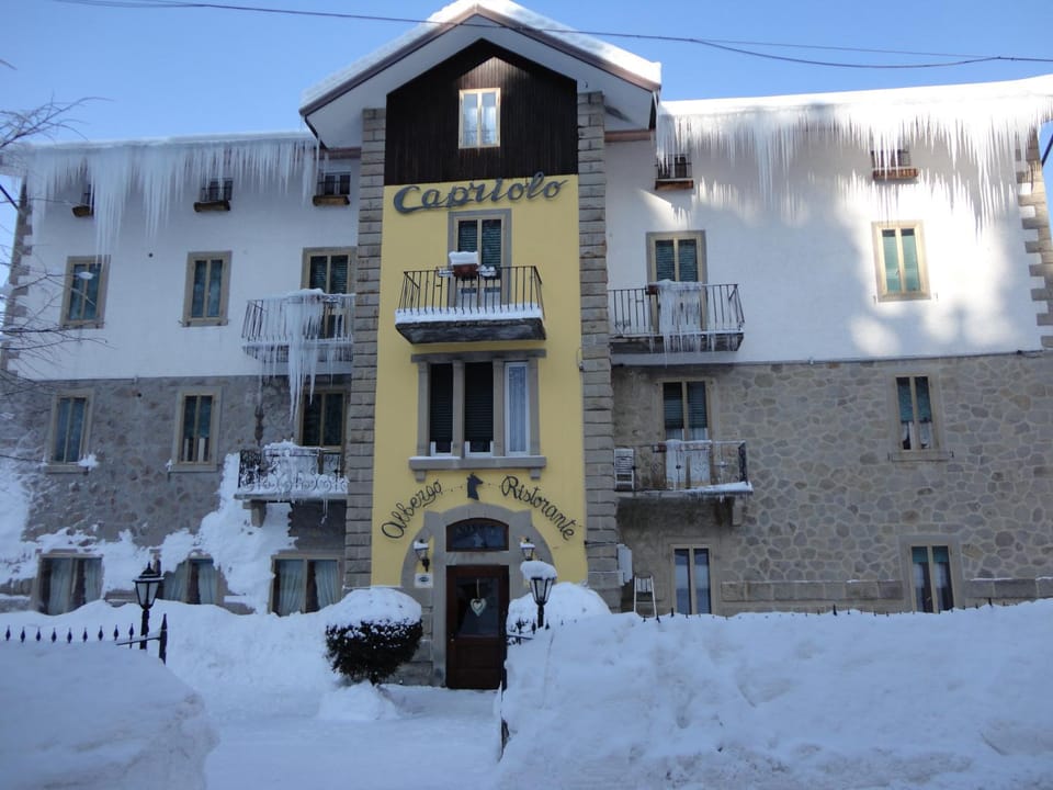 Property building, Facade/entrance, Property logo or sign, Winter