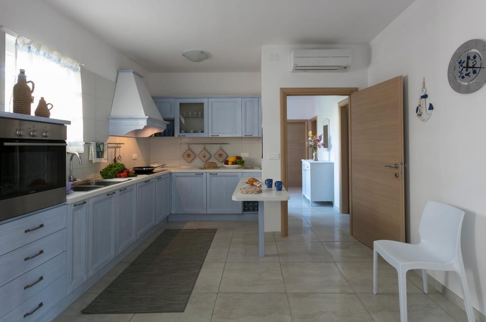 Kitchen or kitchenette, oven, stove