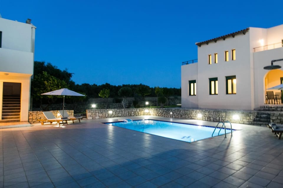 Property building, Night, Pool view, Swimming pool, sunbed