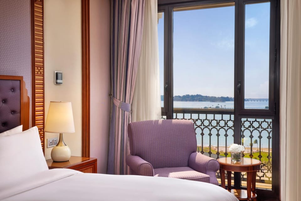 Bed, Seating area, Bedroom, Sea view