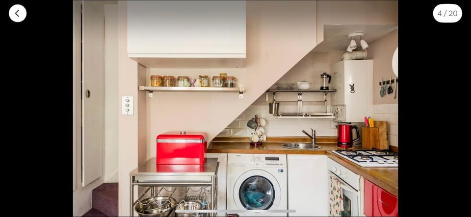 Kitchen or kitchenette, oven, stove, washing machine, dryer