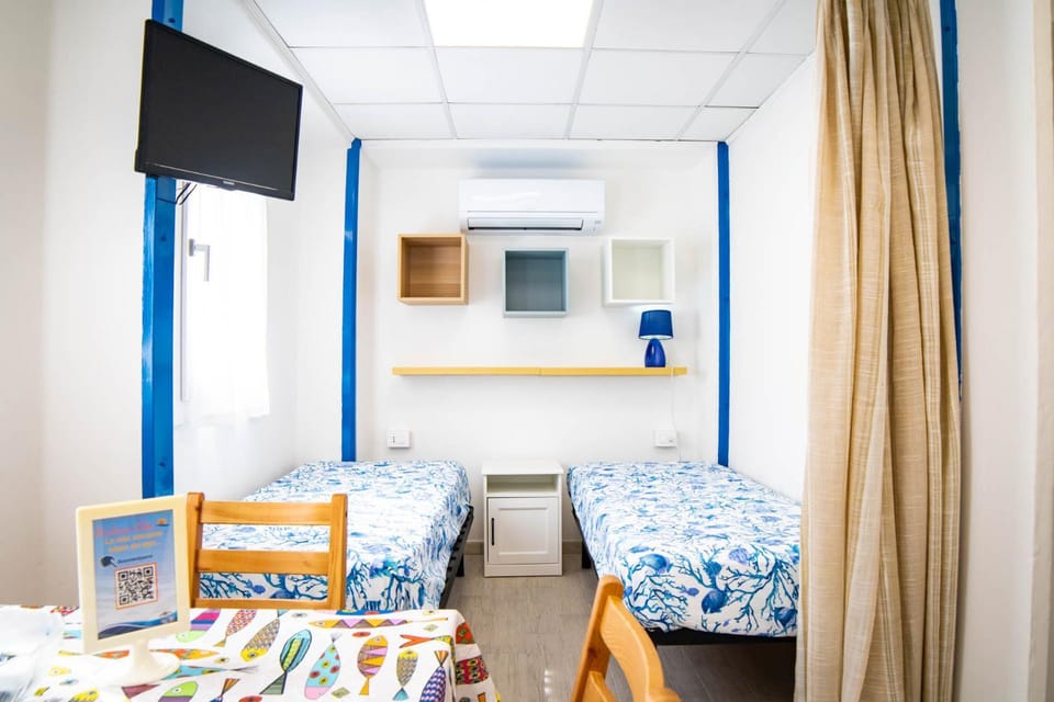 Bed, air conditioner