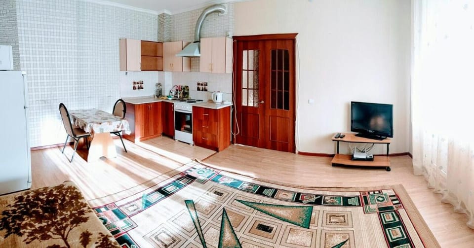 Activities, Bird's eye view, Coffee/tea facilities, Balcony/Terrace, Kitchen or kitchenette, Living room, Food and drinks, Dining area, Text overlay, City view, Family