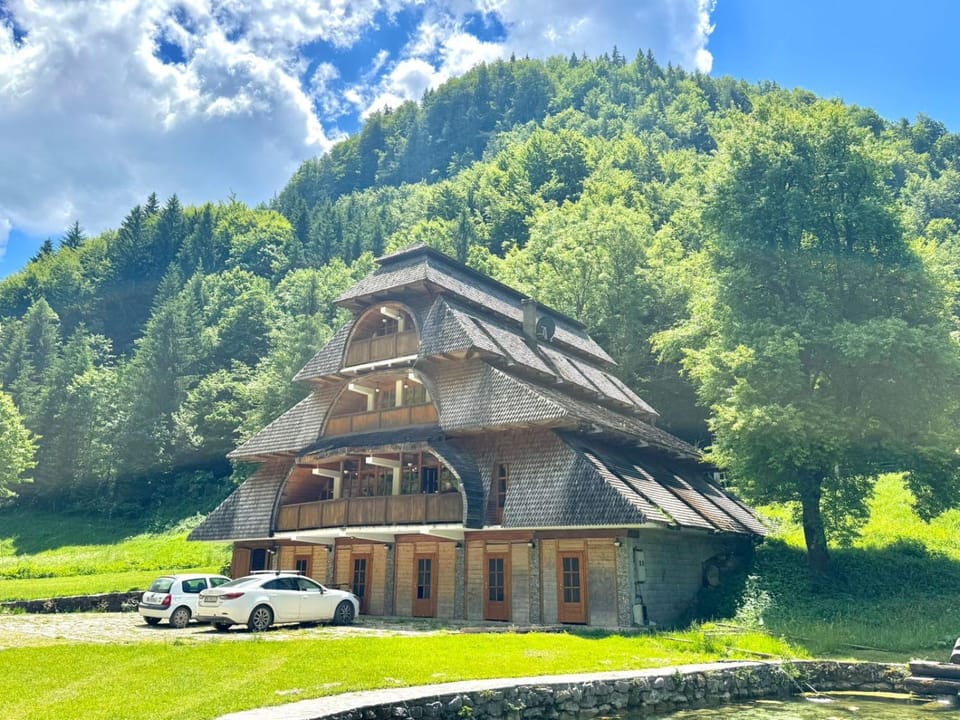 Property building, Nearby landmark, Spring, Day, Natural landscape, Landmark view, Mountain view