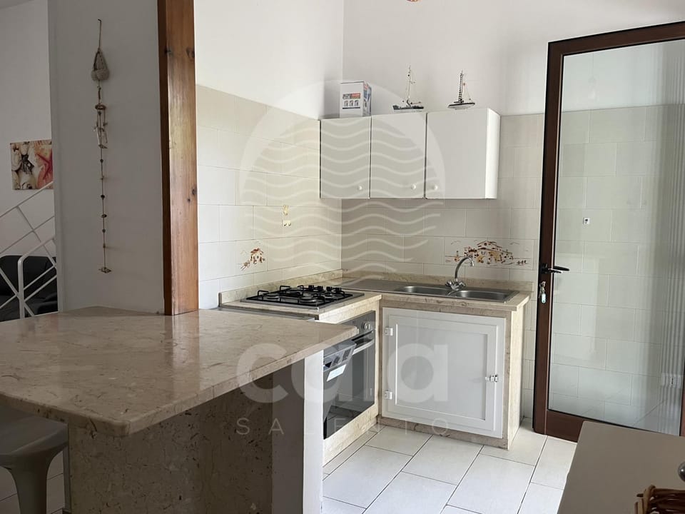 Kitchen or kitchenette, dishwasher, stove