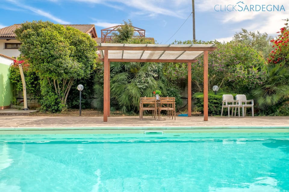 Property building, Patio, Natural landscape, Pool view, Swimming pool, sunbed