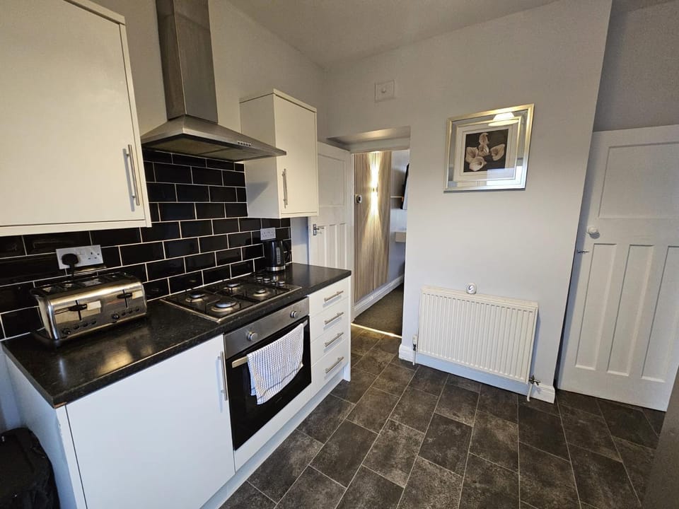 Kitchen or kitchenette, toaster