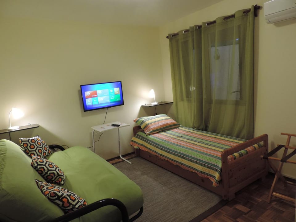 Communal lounge/ TV room, Bed, People, Activities, Living room, Decorative detail, Bedroom, On site, Garden view, Entertainment, Sunset, Family