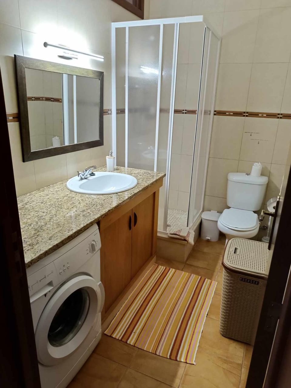 Shower, towels, washing machine, dryer