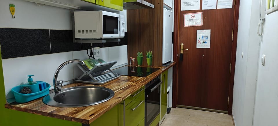 Kitchen or kitchenette, oven, stove