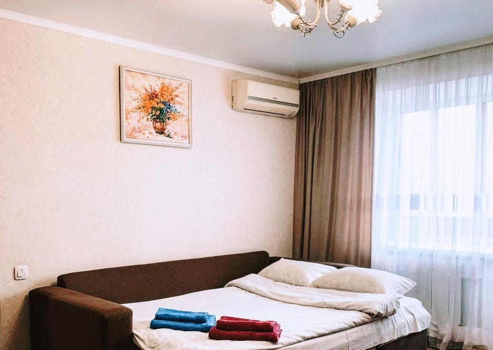 Bed, Photo of the whole room, Bedroom, towels, air conditioner