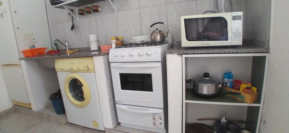 Kitchen or kitchenette, minibar, washing machine