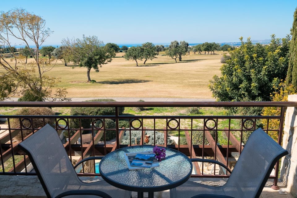 Balcony/Terrace, Seating area, Garden view, Landmark view, Pool view, Sea view