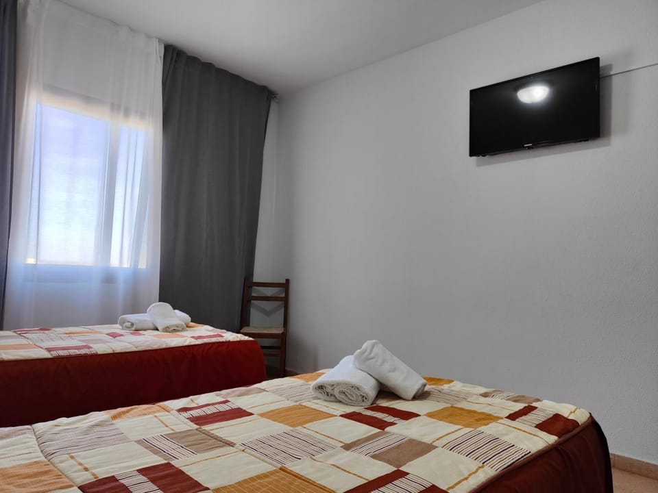 Bed, TV and multimedia, towels
