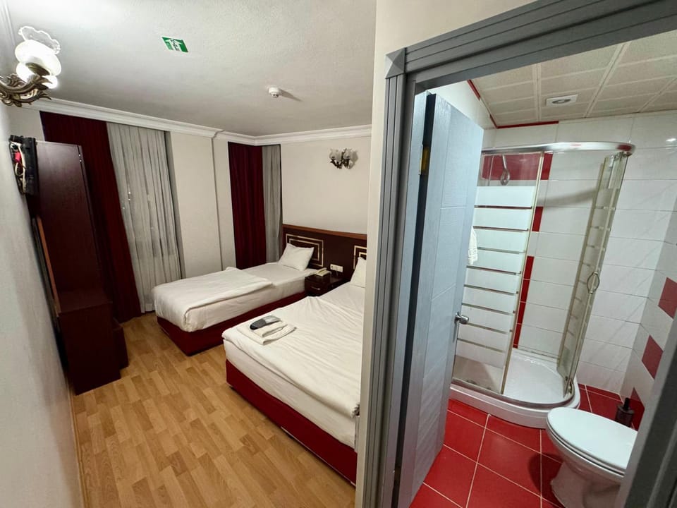 Shower, Toilet, Bed, Bathroom, Photo of the whole room, Bedroom, towels, wardrobe