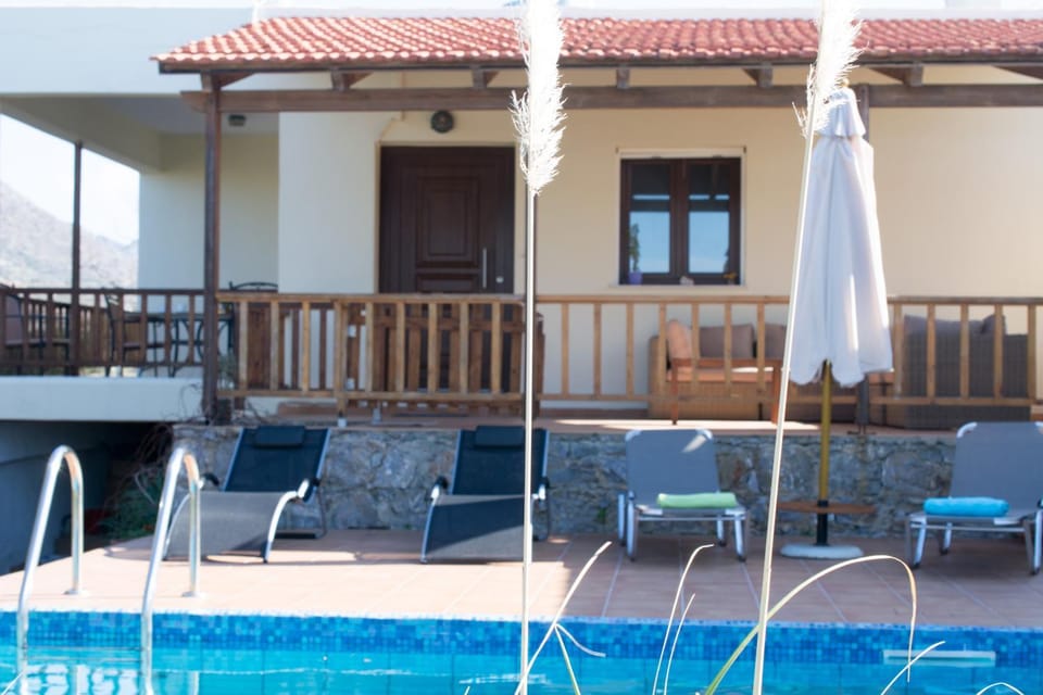 Facade/entrance, Day, Pool view
