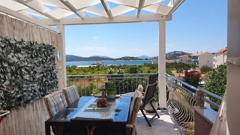 Patio, Day, View (from property/room), Balcony/Terrace, Seating area, Dining area, Sea view