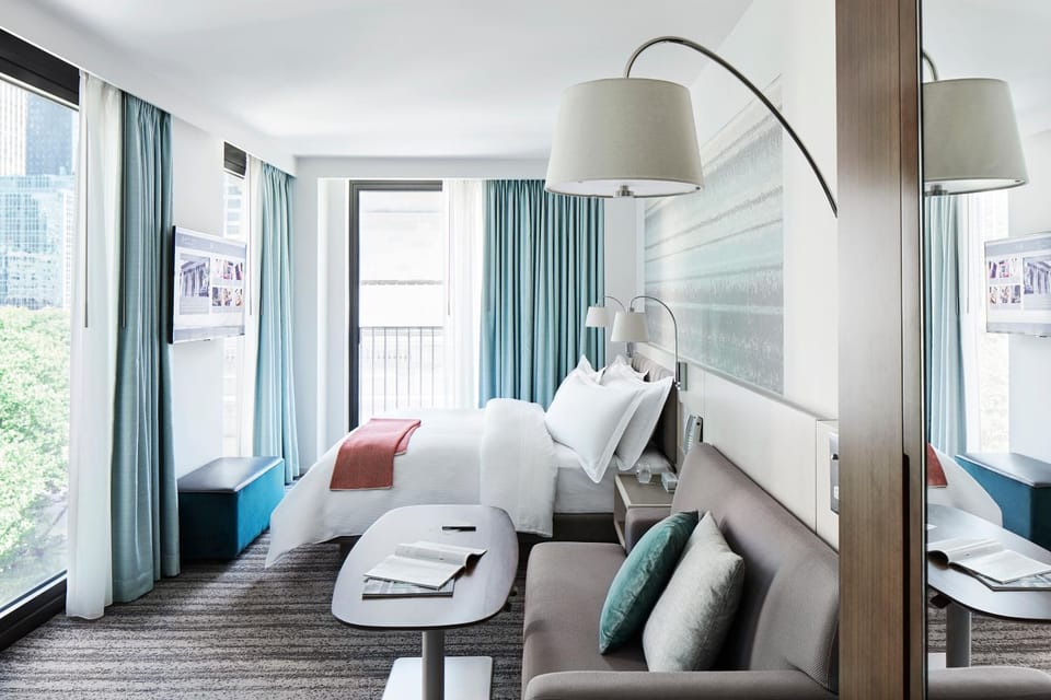 Bed, Seating area, Bedroom, City view