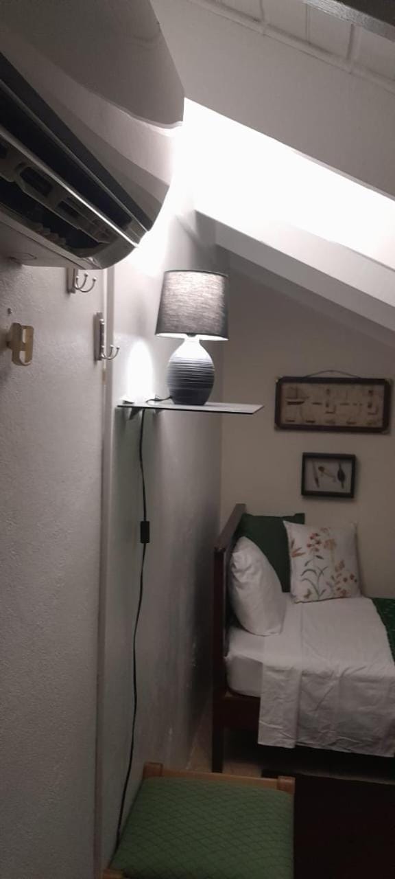 Bed, air conditioner