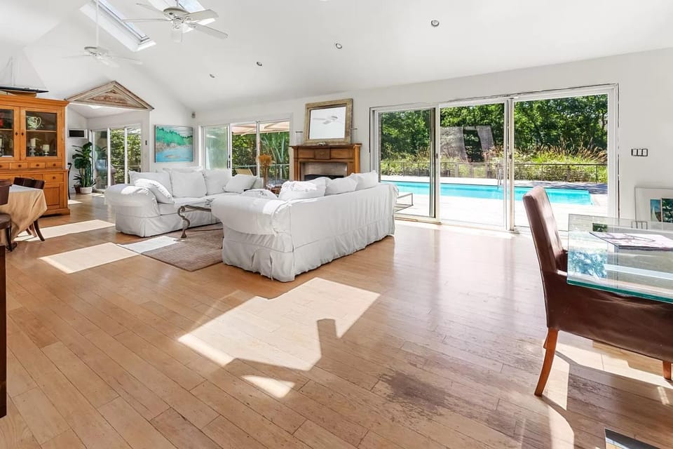 View (from property/room), Living room, Seating area, Dining area, Garden view, Pool view, fireplace