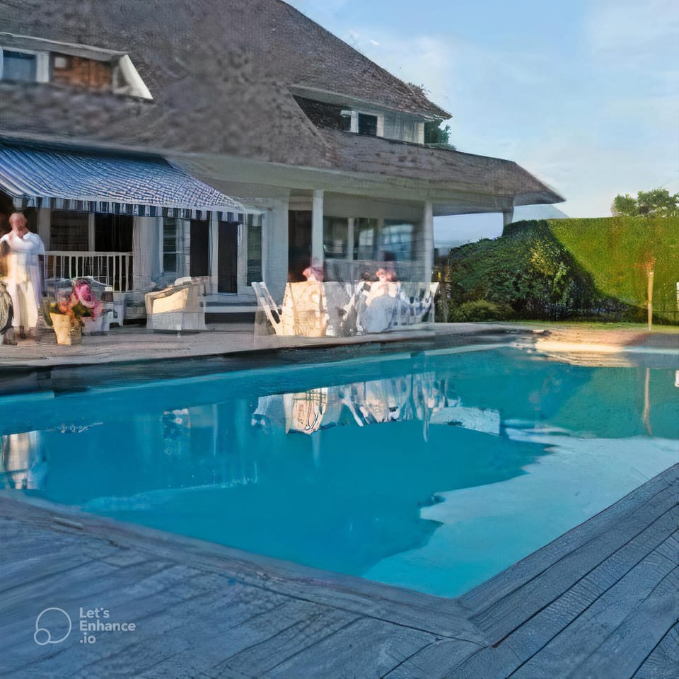 Property building, Patio, Day, Natural landscape, Pool view, Swimming pool, sunbed