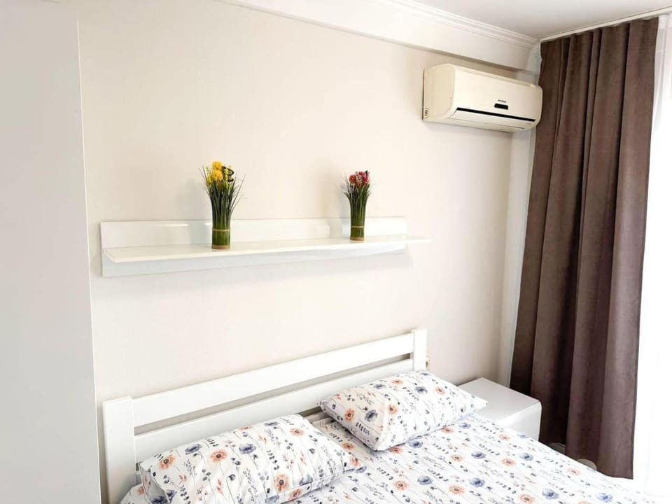 Bed, air conditioner