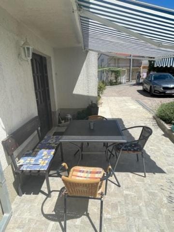Property building, Patio, Seating area, Parking