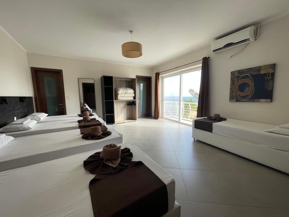 Bed, Photo of the whole room, Bedroom, towels, air conditioner