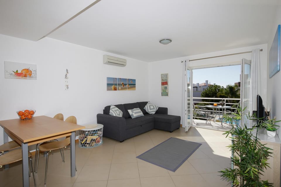 Living room, Seating area, Dining area, Garden view, Pool view