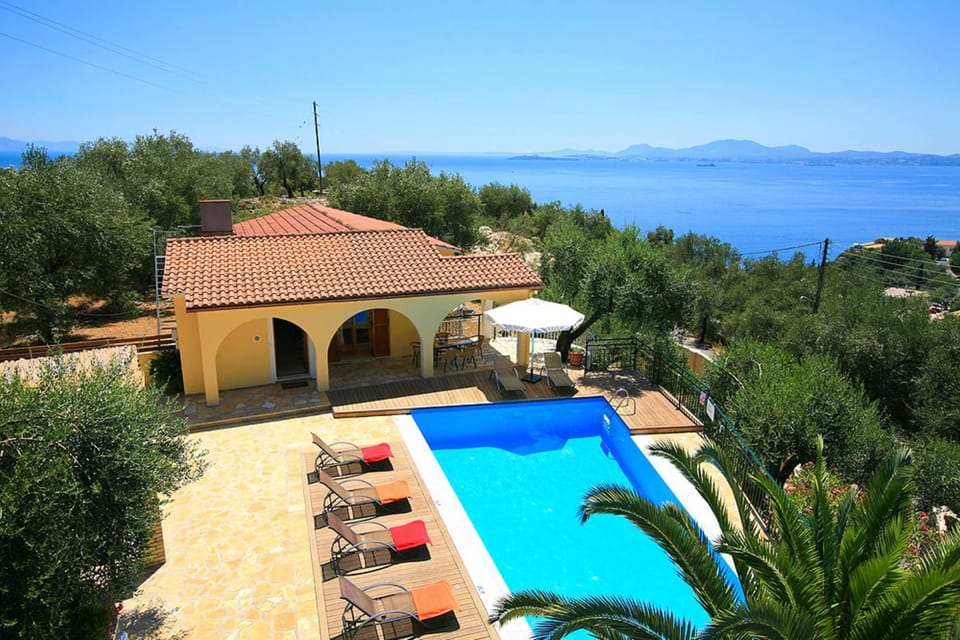 Property building, Day, Natural landscape, Pool view, Sea view, Swimming pool, sunbed