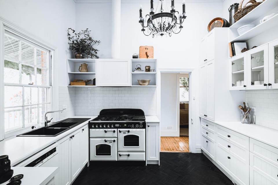 Kitchen or kitchenette, dishwasher, stove, toaster