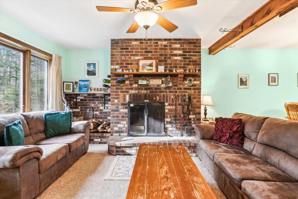 Living room, Seating area, fireplace, flat iron